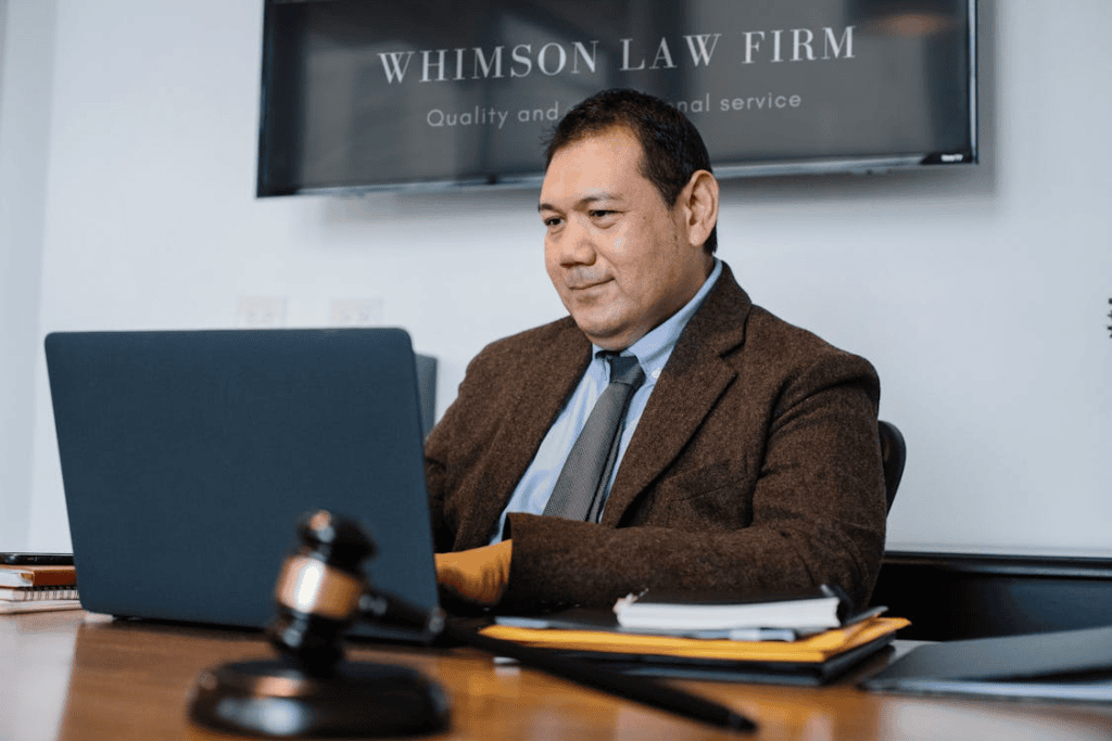 Legal professional reviewing a job offer at a desk