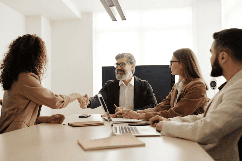 Legal professionals collaborating around a conference table