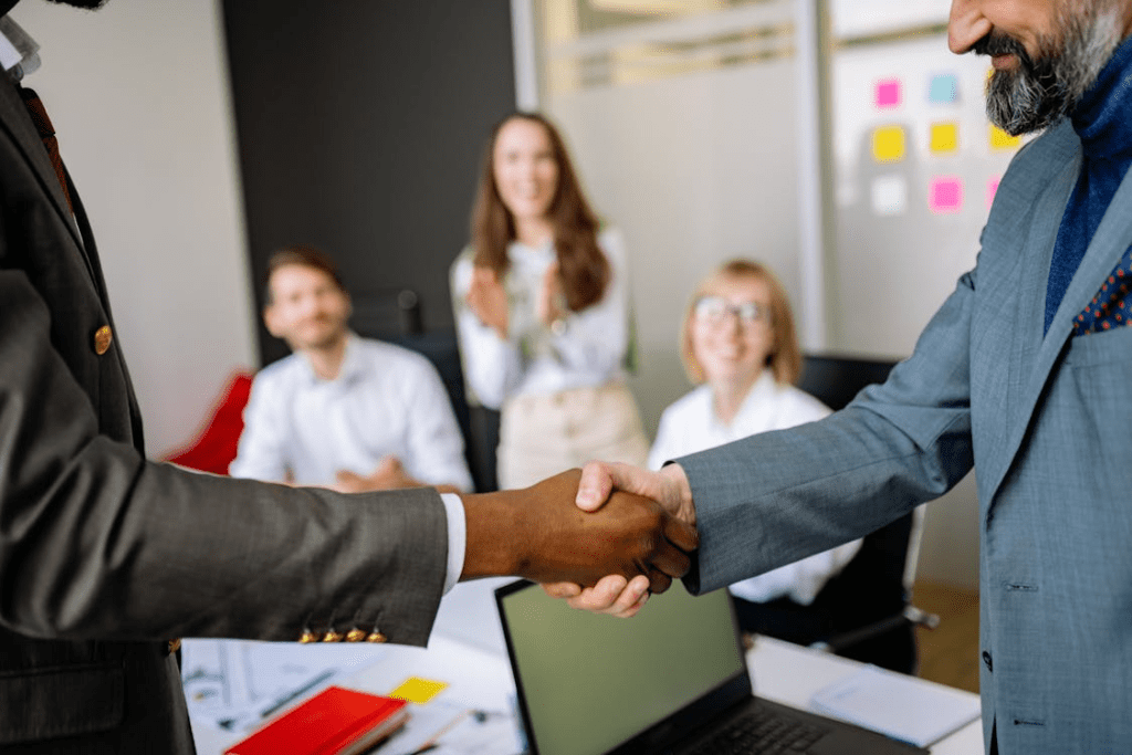 Close Up Shot of 2 Person Shake Hands